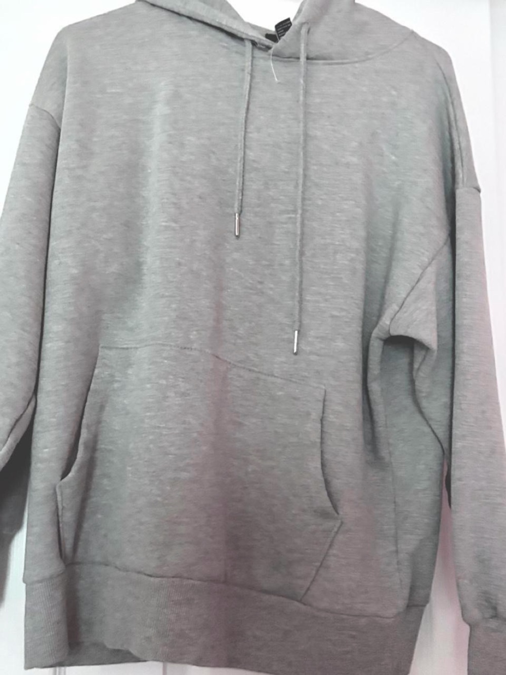FOREVER 21 woman’s grey hoodie.